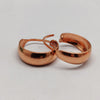 Earrings with a rose gold texture and copper finish