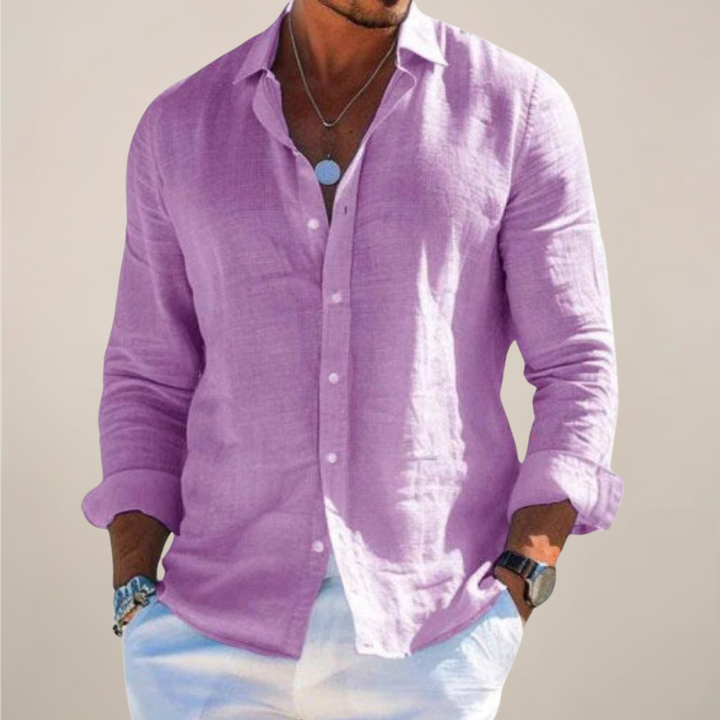 Relaxed-fit men's linen shirt with front button placket and long sleeves.