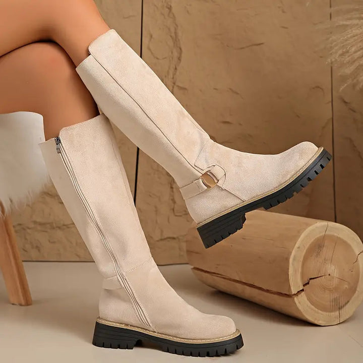 High boots with a thick, non-slip sole.
