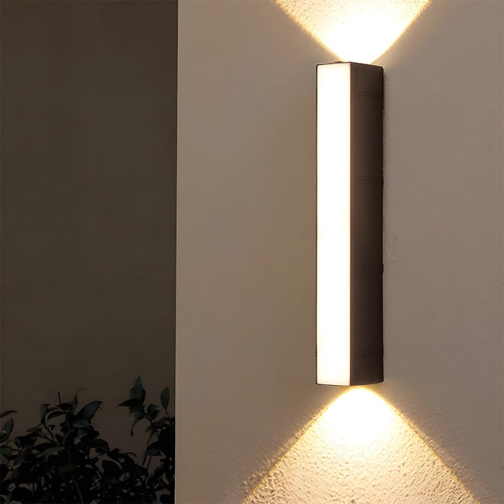 Outdoor Wall Sconce with Up and Down LED Lighting and Modern Architectural Design