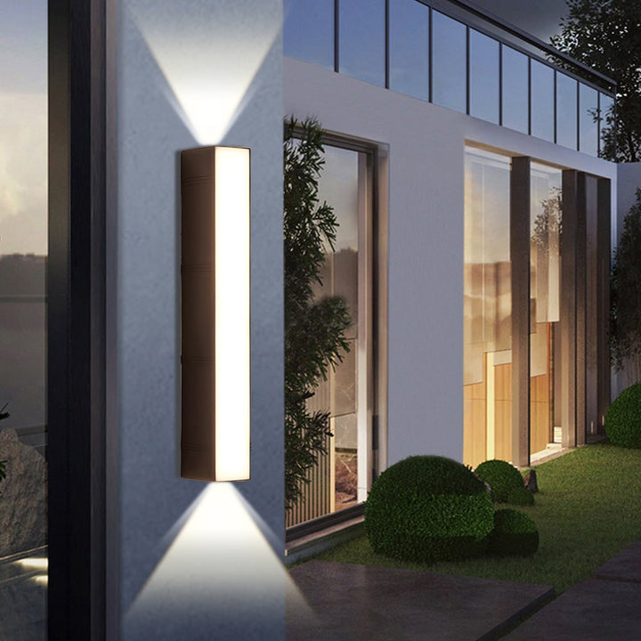 Outdoor Wall Sconce with Up and Down LED Lighting and Modern Architectural Design