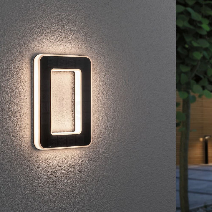 Solar-lit house number with LED and dusk sensor