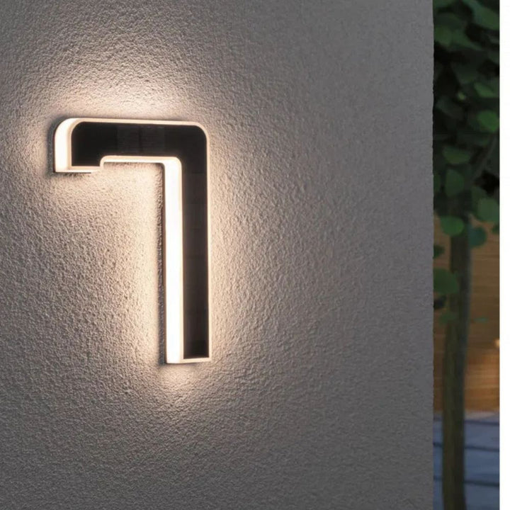 Solar-lit house number with LED and dusk sensor