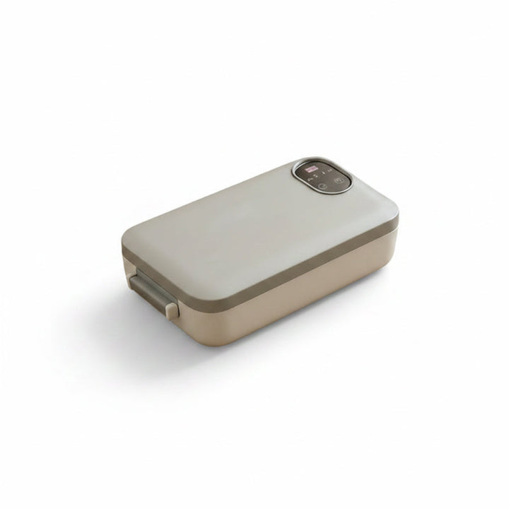 Cordless, self-heating electric lunch box with stainless steel insert.